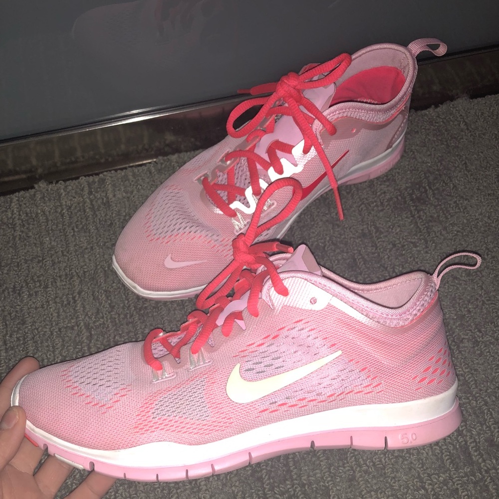 Light pink nike free runs 5.0